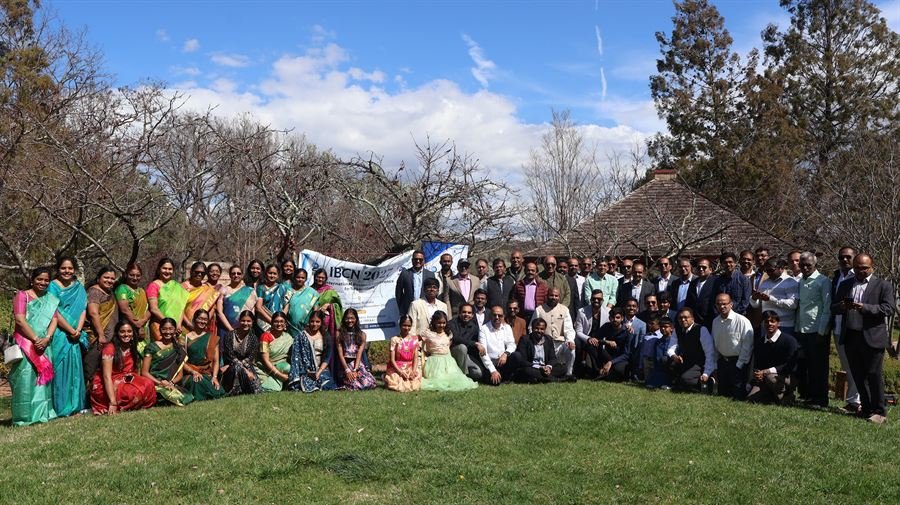 IBCN community gathering in traditional attire at the Launch Party, Canberra